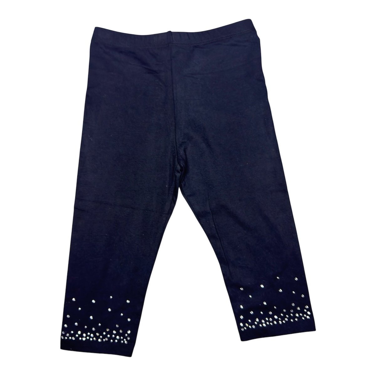 Dark navy blue capri pants with white rhinestone embellishments at the hemlines